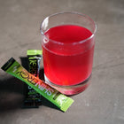 Shinergy drink mixed in a glass with Daytime and Nighttime stick packs — image 6
